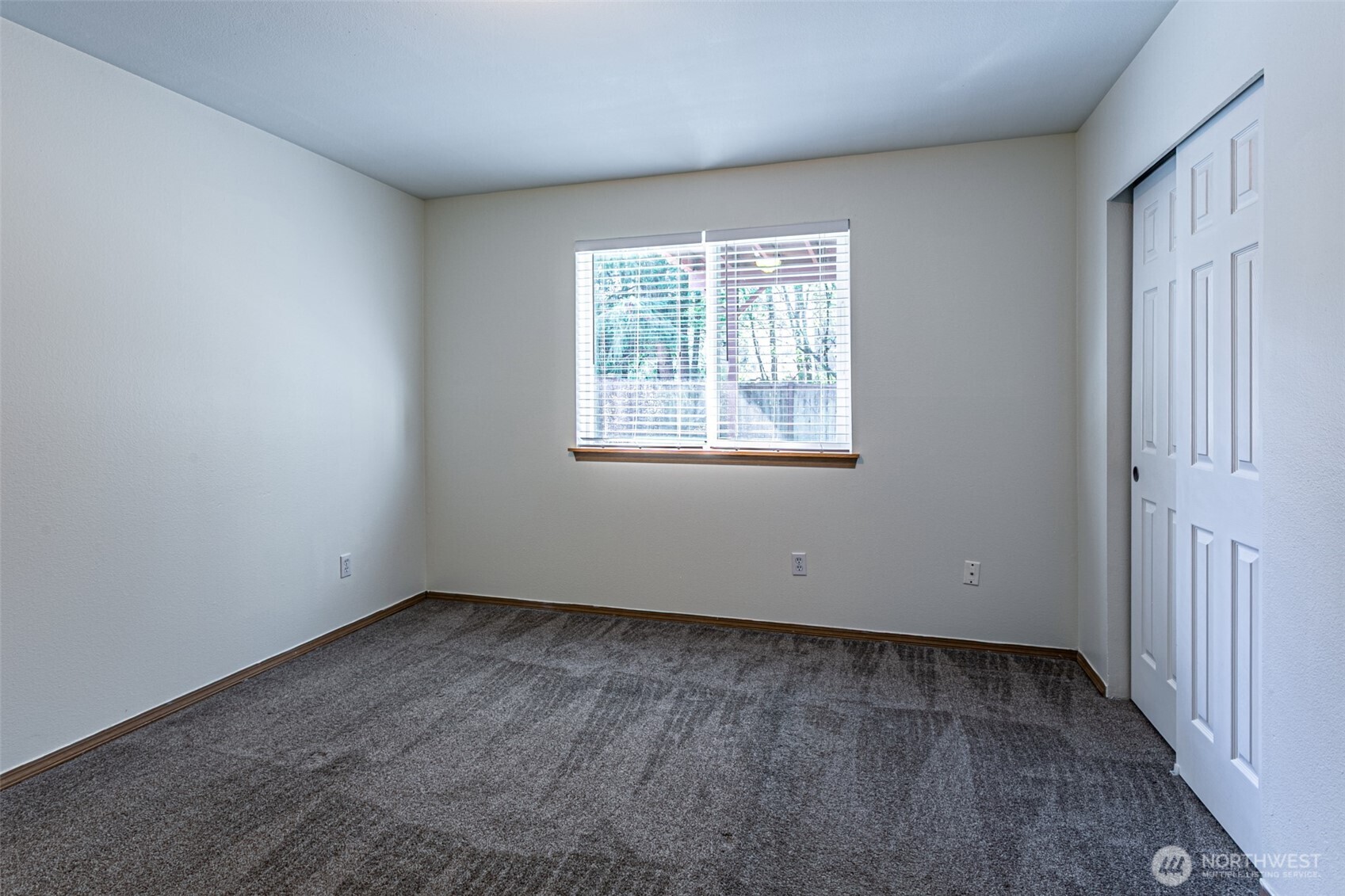 8342 49th Loop Southeast Olympia, WA 98513 - Photo 20 of 24 an empty room with a window
