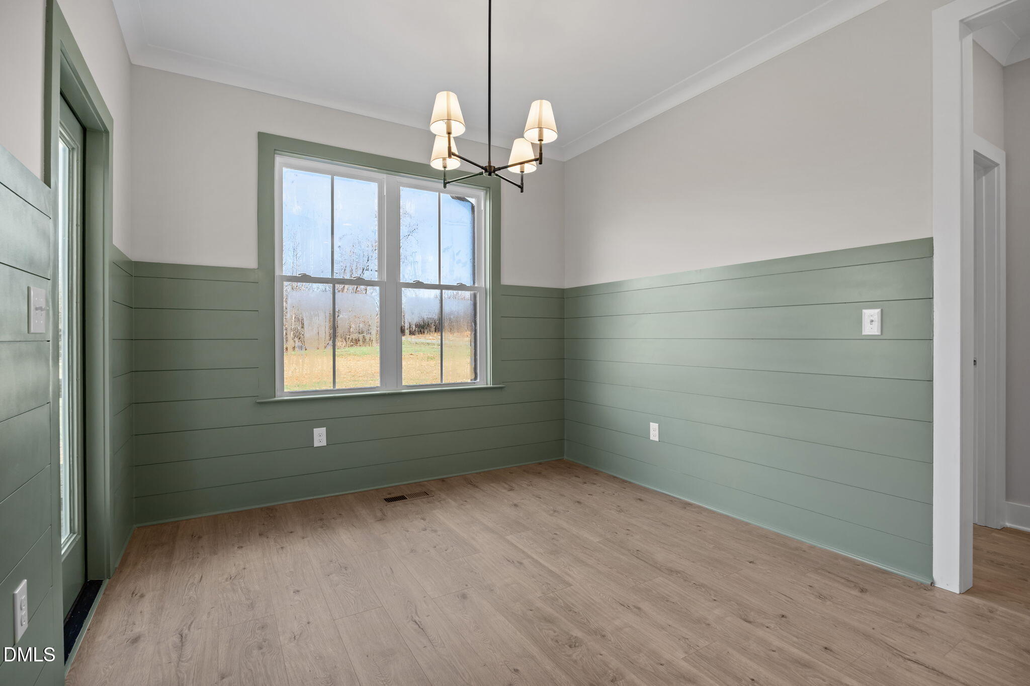 1225 Antioch Church Road Timberlake, NC 27583 - Photo 12 of 45 wooden floor in an empty room with a window