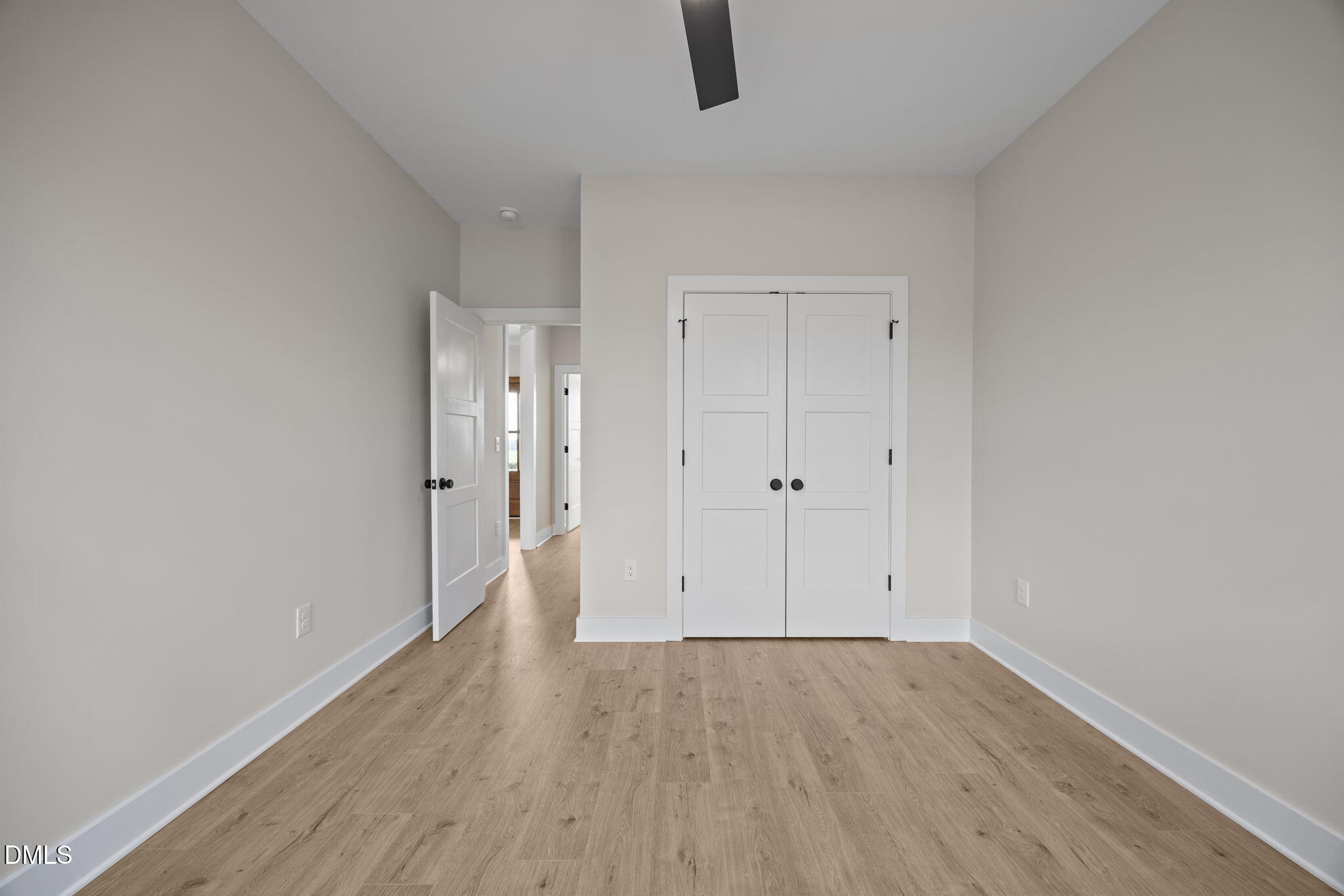 1225 Antioch Church Road Timberlake, NC 27583 - Photo 18 of 45 a view of an empty room with wooden floor