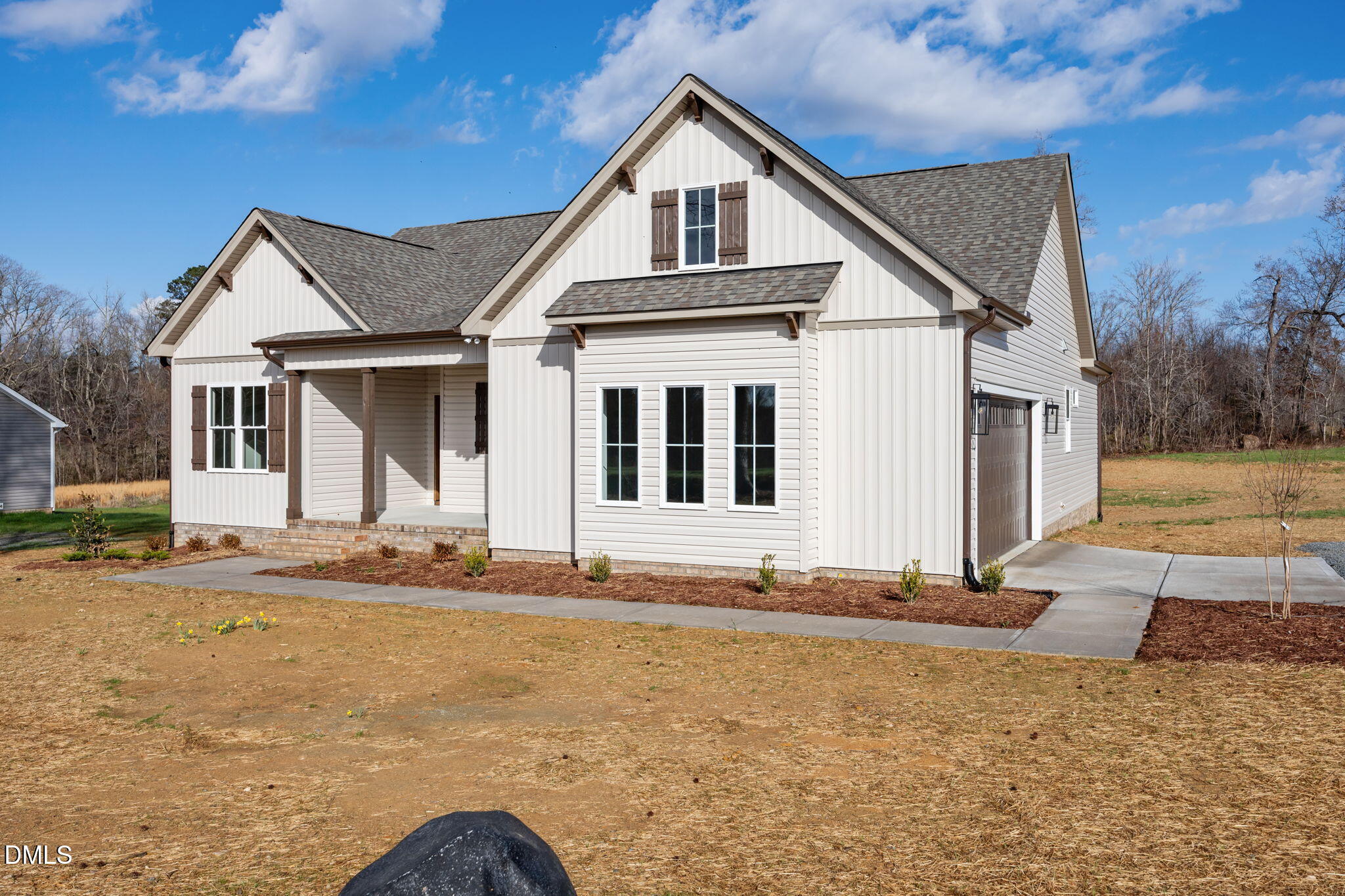 1225 Antioch Church Road Timberlake, NC 27583 - Photo 2 of 45 a front view of a house with a yard