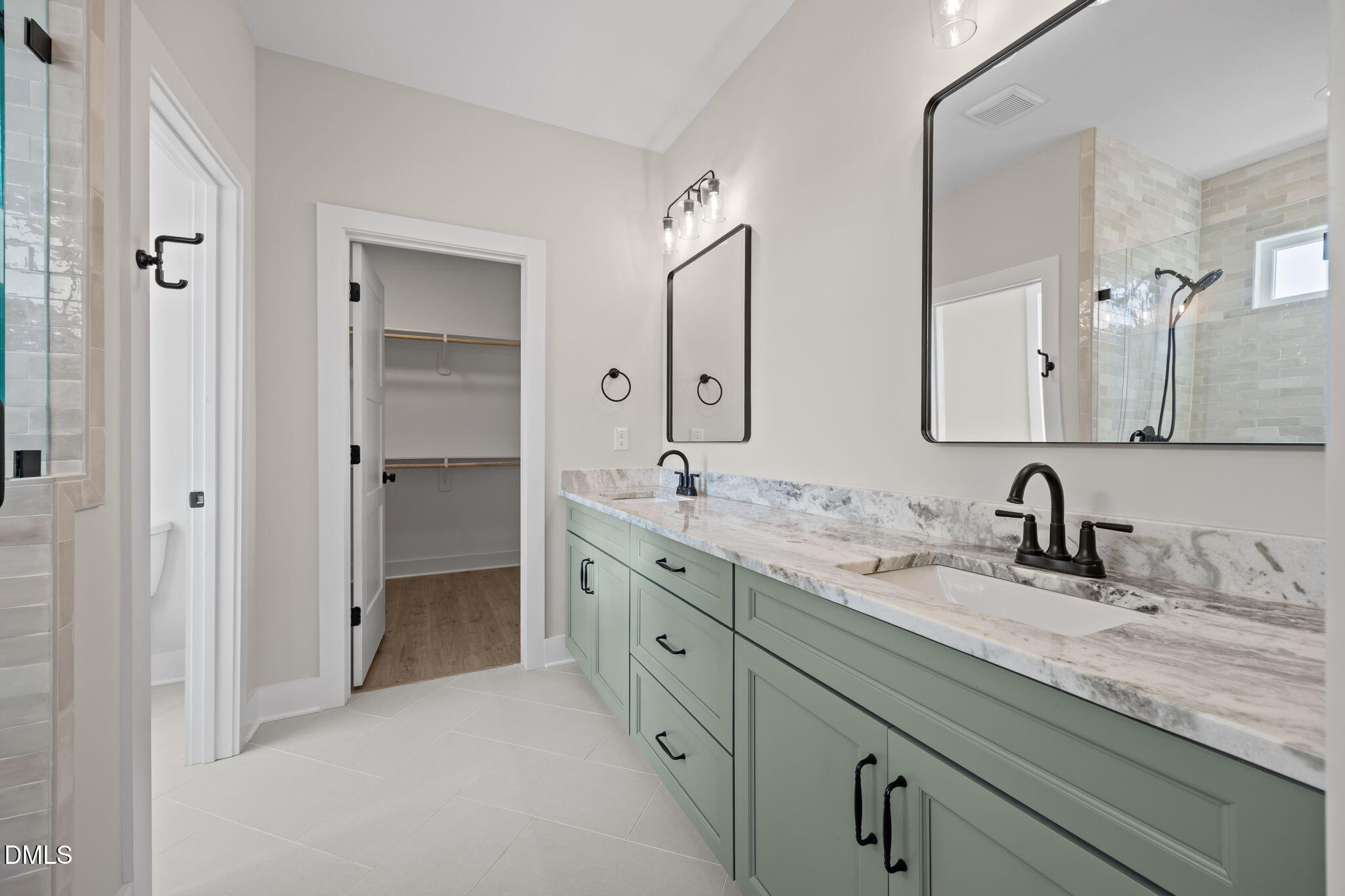 1225 Antioch Church Road Timberlake, NC 27583 - Photo 24 of 45 a bathroom with double sink and a mirror