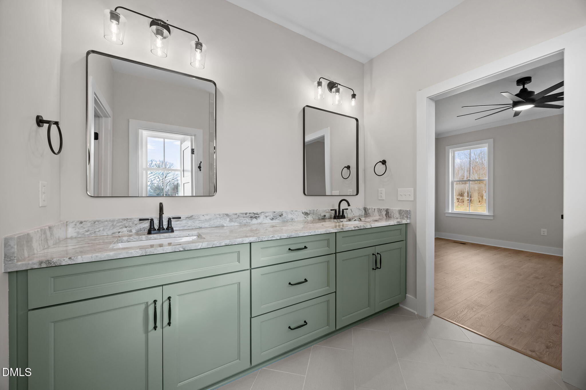 1225 Antioch Church Road Timberlake, NC 27583 - Photo 26 of 45 a bathroom with double vanity sinks and a mirror