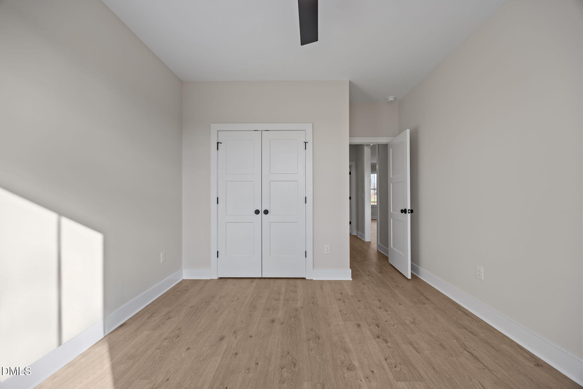 1225 Antioch Church Road Timberlake, NC 27583 - Photo 29 of 45 a view of an empty room with wooden floor