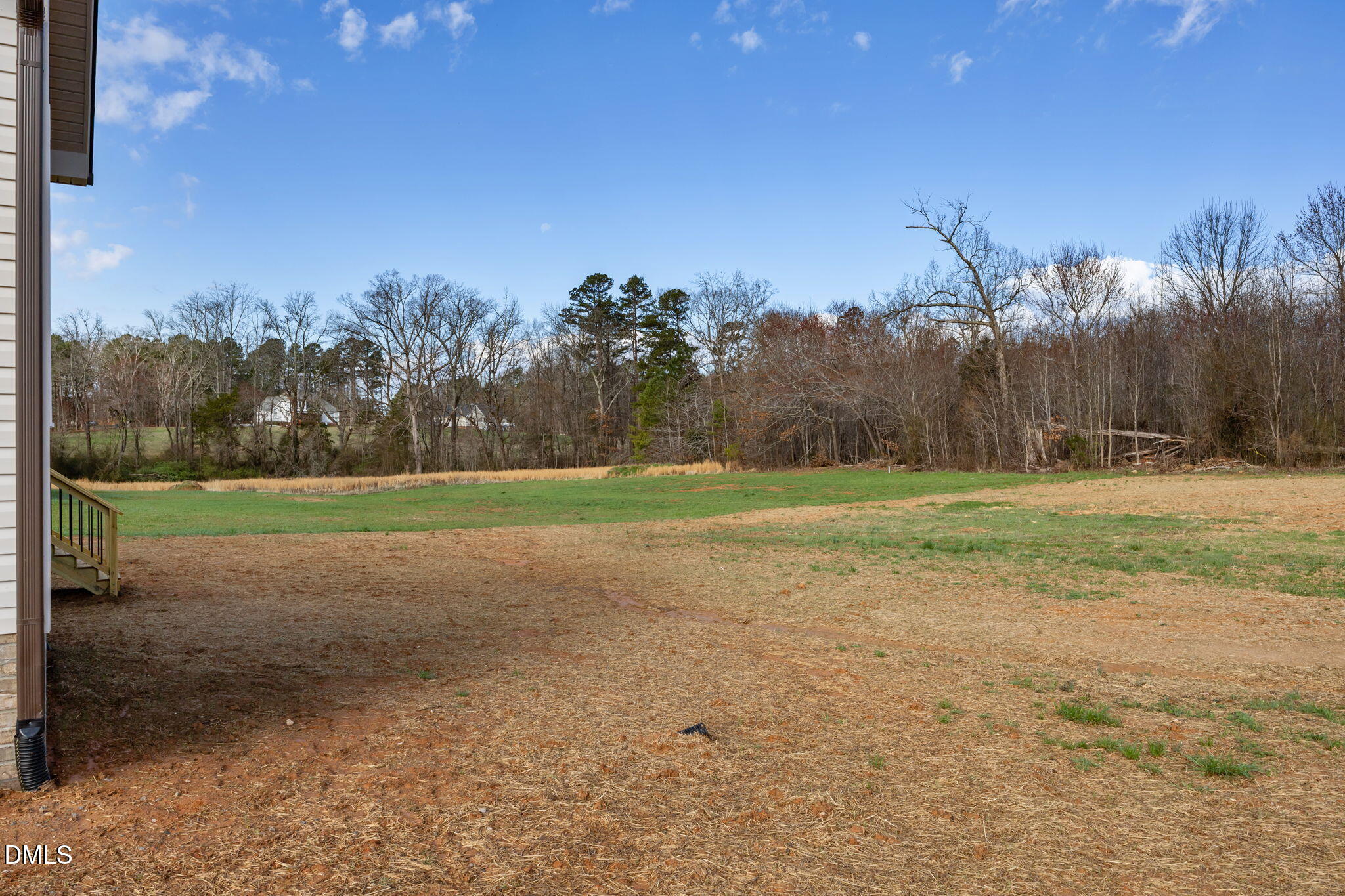 1225 Antioch Church Road Timberlake, NC 27583 - Photo 41 of 45 a view of a field with trees in the background