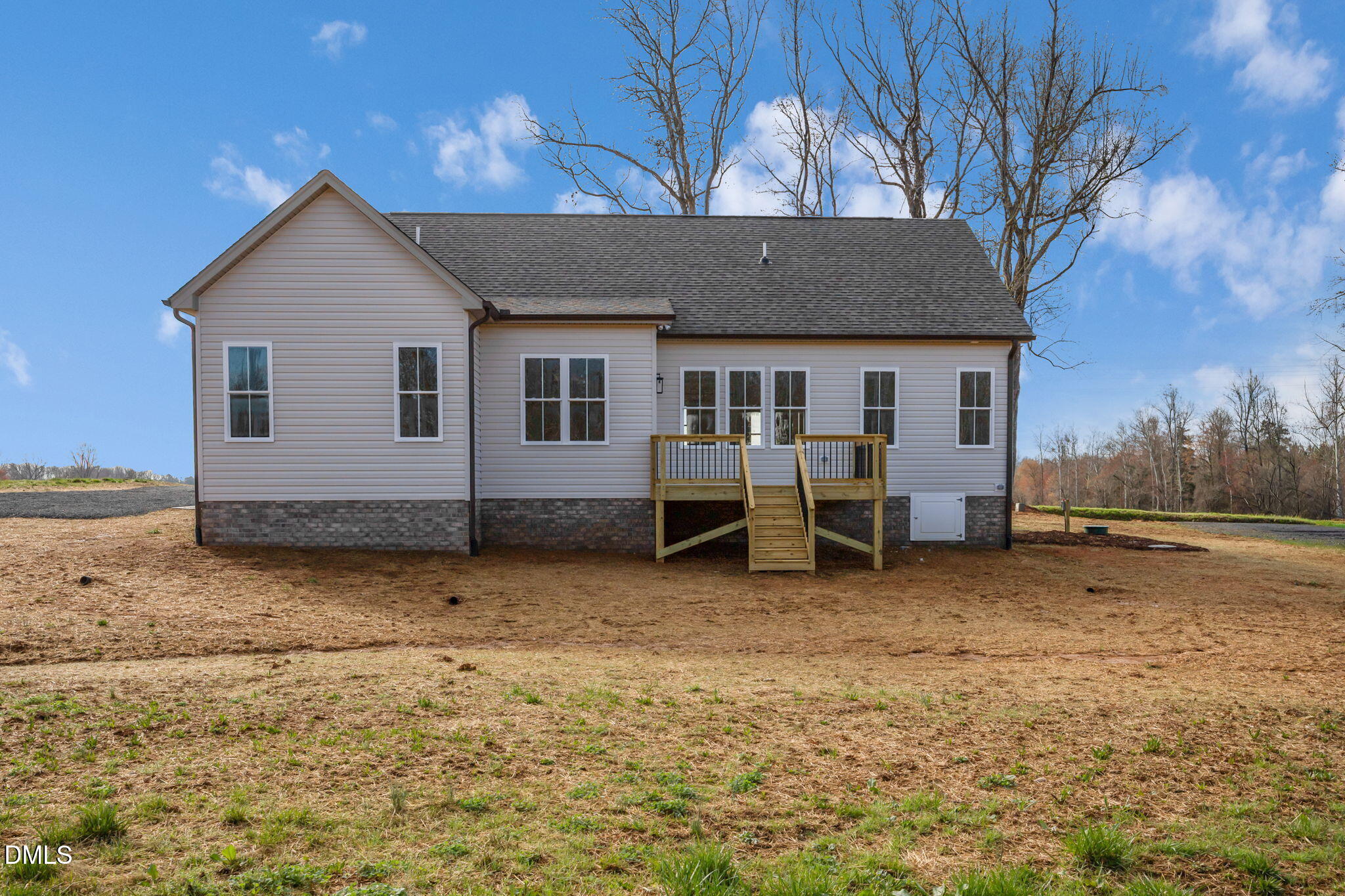 1225 Antioch Church Road Timberlake, NC 27583 - Photo 42 of 45 a view of a house with a backyard