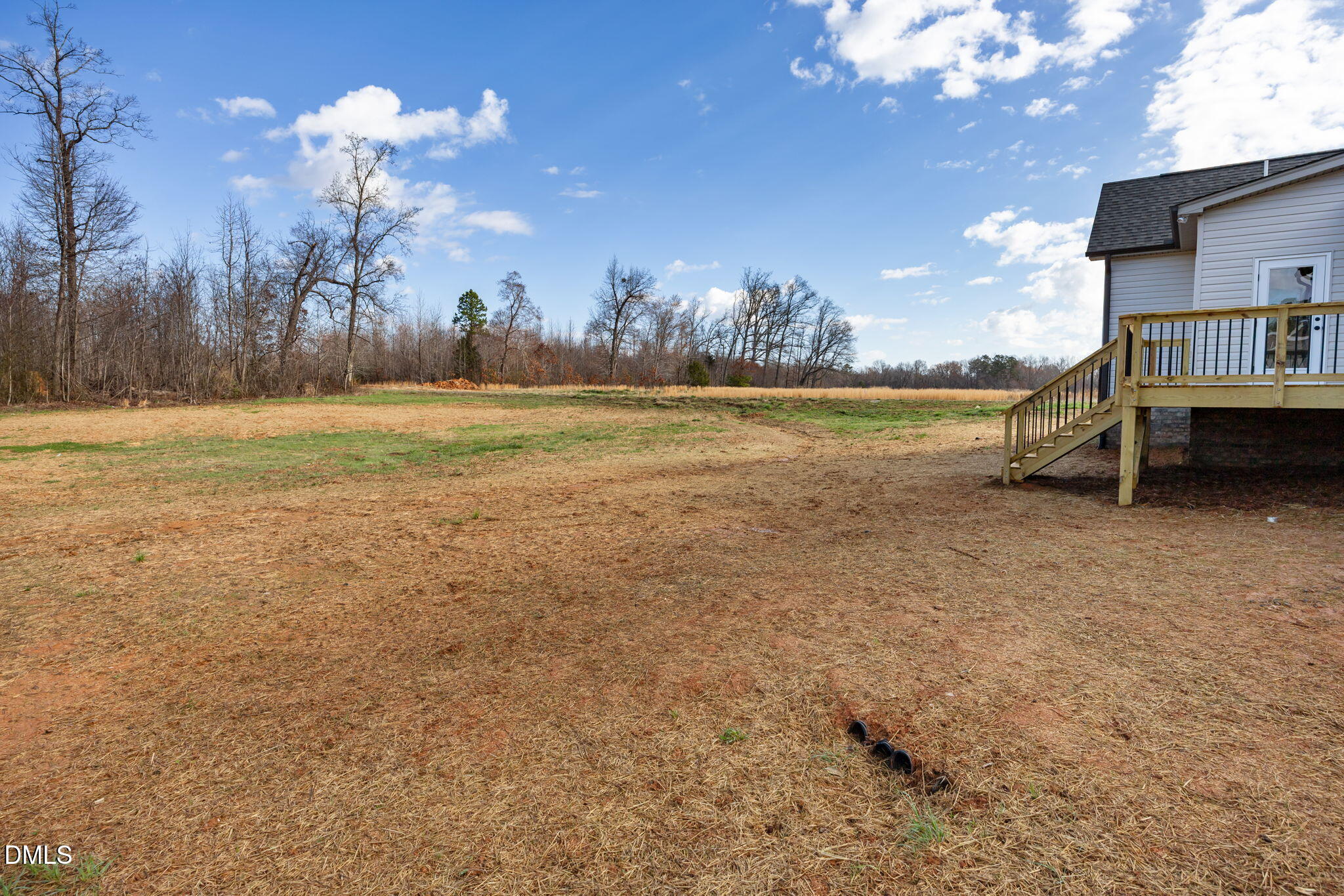 1225 Antioch Church Road Timberlake, NC 27583 - Photo 43 of 45 a view of a house with a yard and a large tree