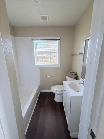 a bathroom with a sink and a toilet