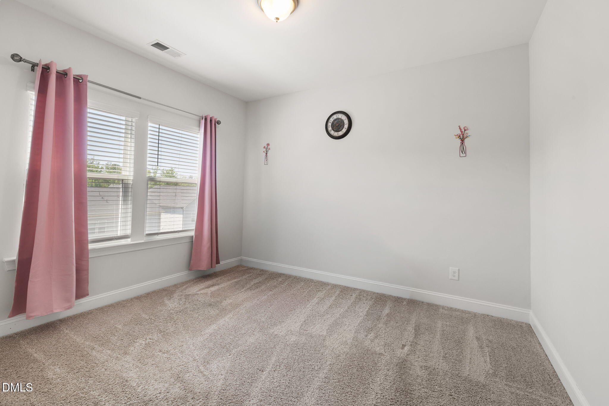 3422 Longleaf Estates Drive Raleigh, NC 27616 - Photo 24 of 71 a view of a livingroom with an empty space and a window