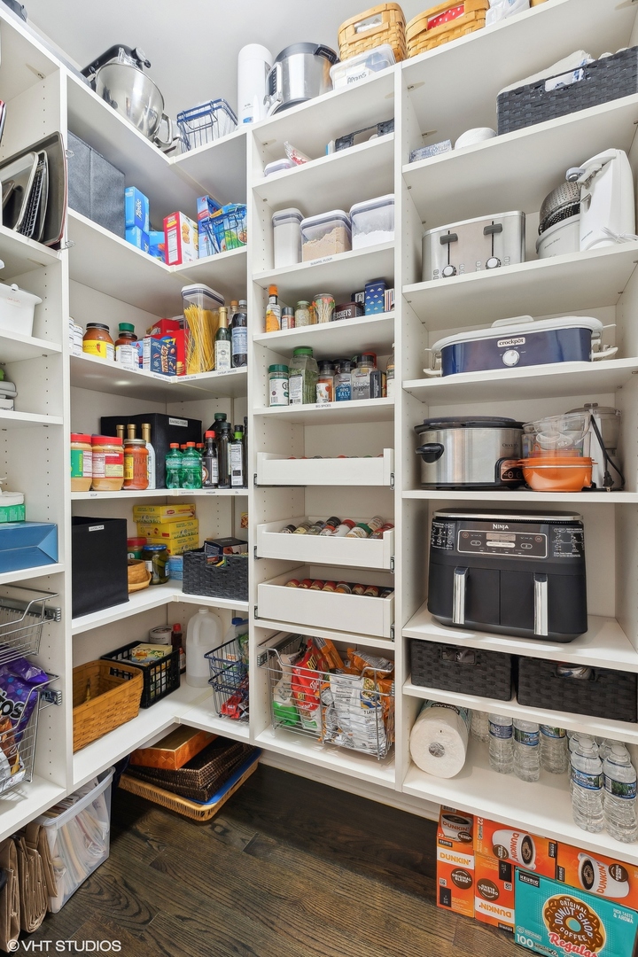 1429 West Cullom Avenue Chicago, IL 60613 - Photo 14 of 53 a cabinet with water heater and storage