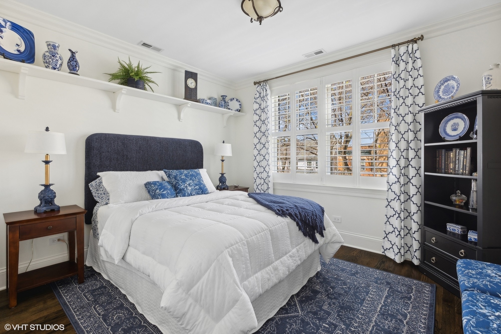 1429 West Cullom Avenue Chicago, IL 60613 - Photo 27 of 53 a bedroom with a bed and a window