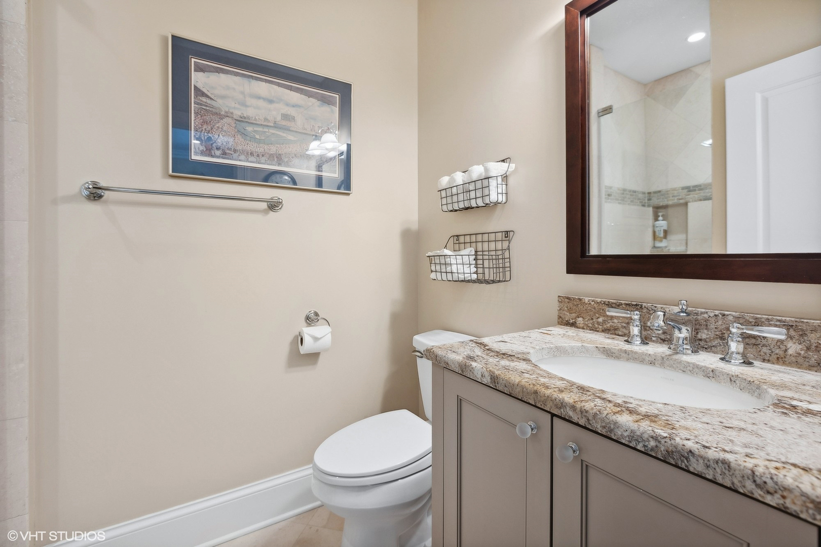 1429 West Cullom Avenue Chicago, IL 60613 - Photo 31 of 53 a bathroom with a granite countertop sink mirror vanity and toilet