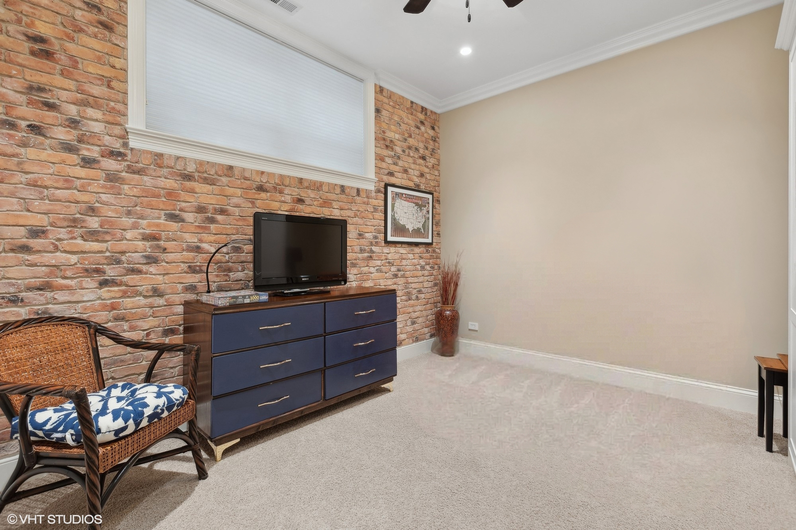 1429 West Cullom Avenue Chicago, IL 60613 - Photo 38 of 53 a room with furniture and flat screen tv