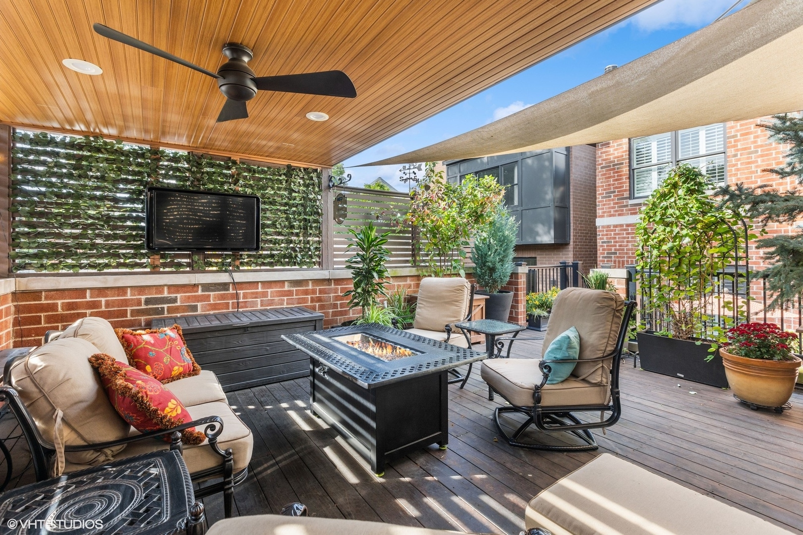 1429 West Cullom Avenue Chicago, IL 60613 - Photo 43 of 53 a outdoor living space with furniture and a flat screen tv