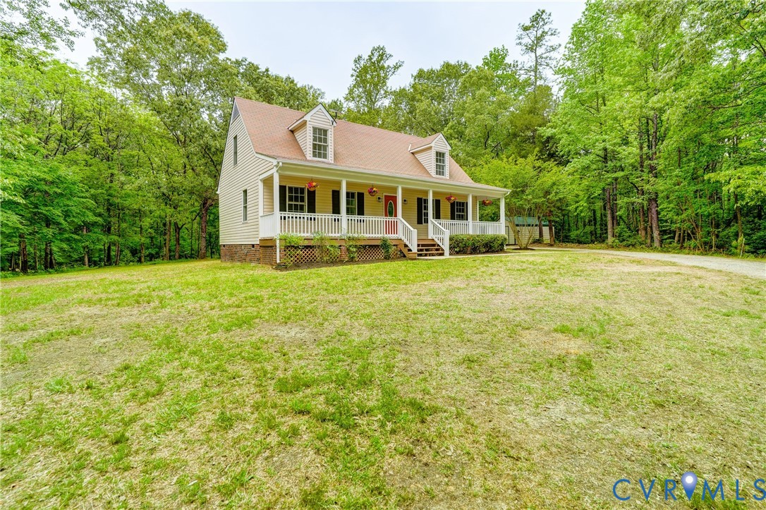 3820 Mt Pleasant Road Providence Forge, VA 23140 - Photo 30 of 40 a front view of a house with a garden