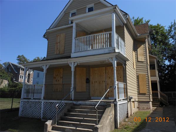 49-51 Rutledge Avenue Springfield, MA 01105 - Photo 1 of 4 a view of a house with a deck