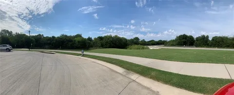 a view of a terrace with a lake view