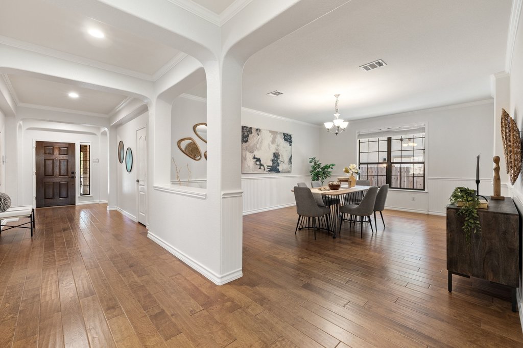 11129 Bastogne Loop Austin, TX 78739 - Photo 18 of 40 The architectural details throughout this home are what quietly set it apart. Crown molding, arched openings, and beadboard/wainscoting accents bring warmth and character to every space.