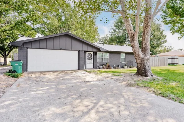 a house view with a backyard space
