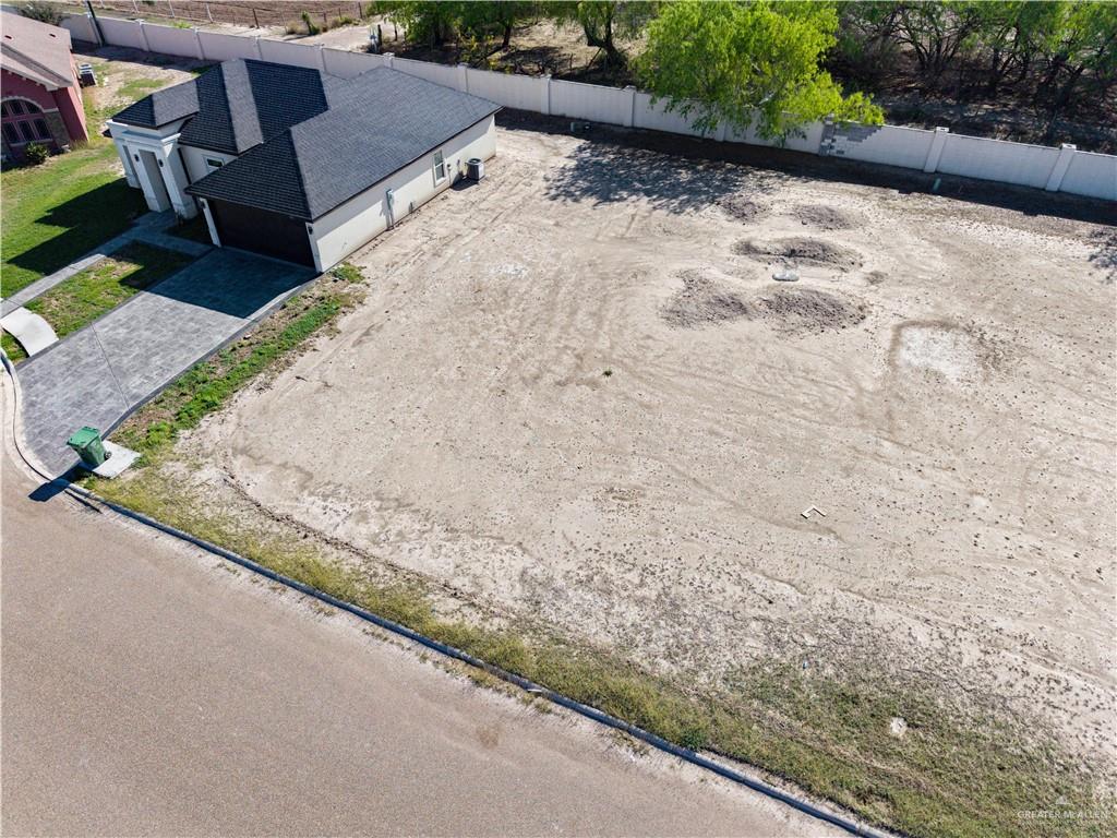 313 River Wood Street Rio Grande City, TX 78582 - Photo 2 of 6 a view of a house with a yard