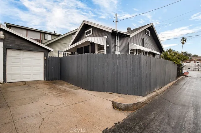 a front view of a house with a garage