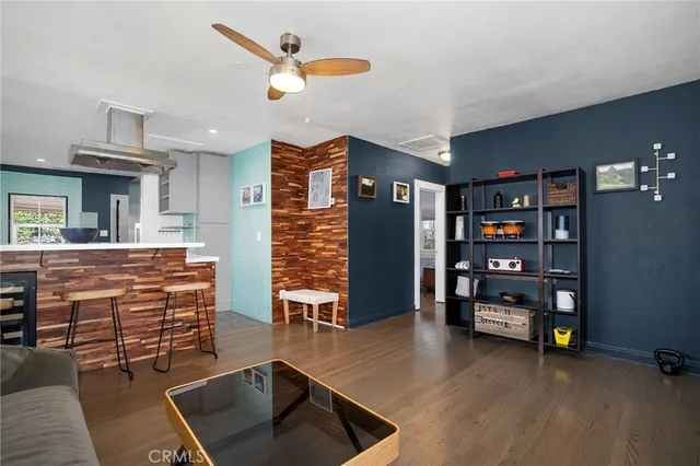 a room with furniture and gym equipment