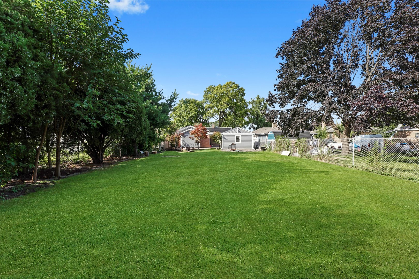 5809 Huron Street Berkeley, IL 60163 - Photo 20 of 26 a view of house with garden space