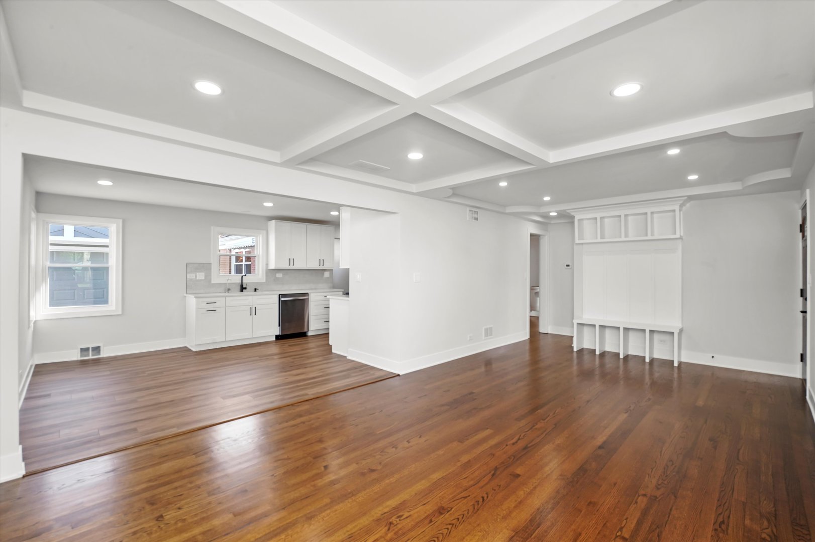 5809 Huron Street Berkeley, IL 60163 - Photo 6 of 26 a view of an empty room with wooden floor and a window