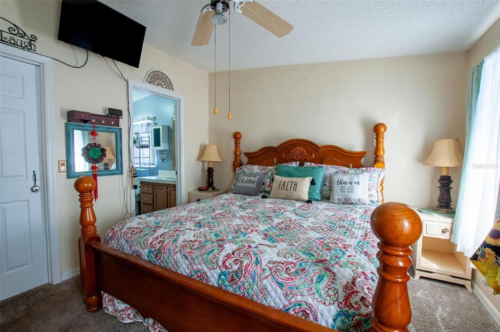 1317 Southwest Martha Street Arcadia, FL 34266 - Photo 12 of 25 a bedroom with a bed and wooden floor