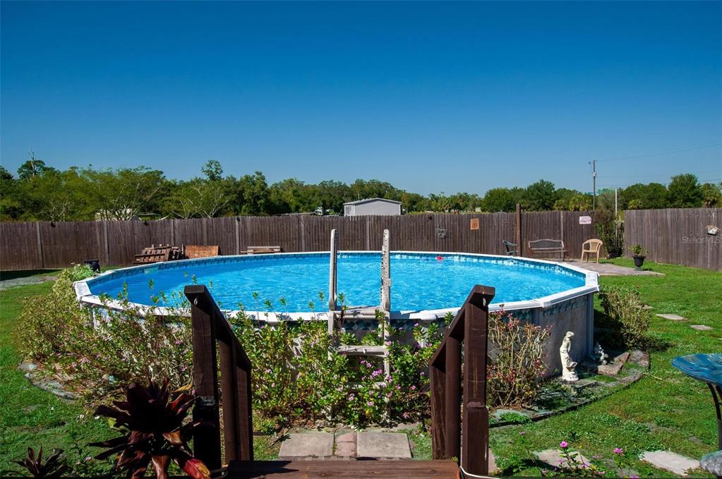 1317 Southwest Martha Street Arcadia, FL 34266 - Photo 17 of 25 a view of a garden with chairs