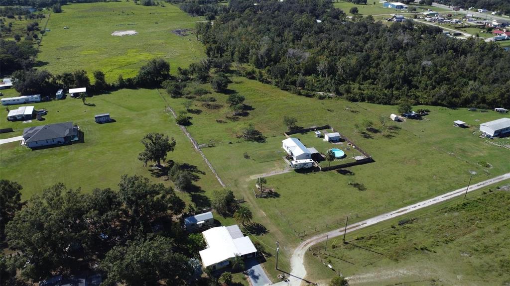 1317 Southwest Martha Street Arcadia, FL 34266 - Photo 22 of 25 an aerial view of a golf course with parking space