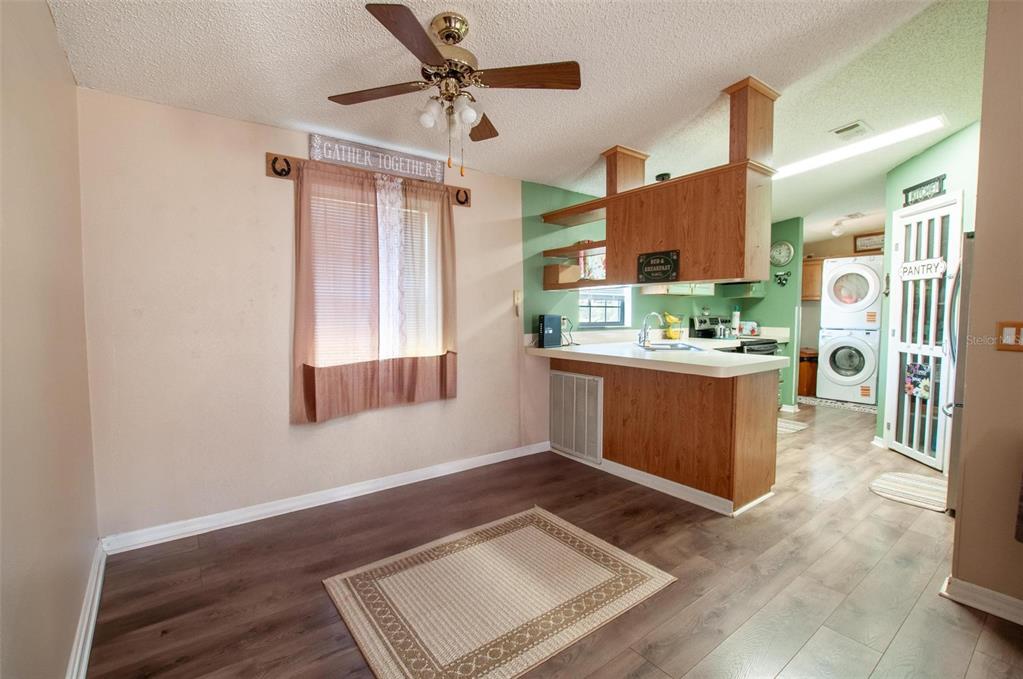 1317 Southwest Martha Street Arcadia, FL 34266 - Photo 9 of 25 a view of a room with window and wooden floor