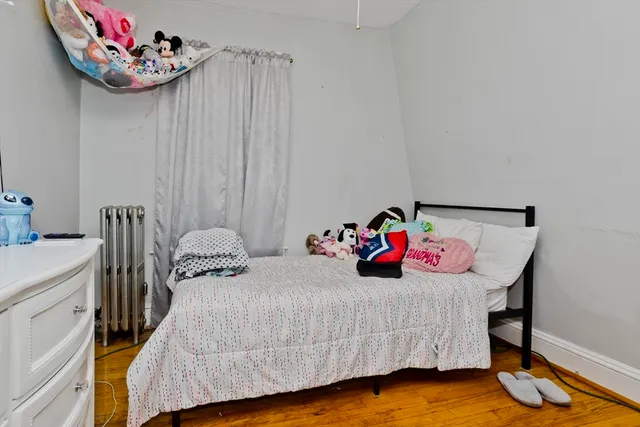 a bathroom with a sink mirror and vanity