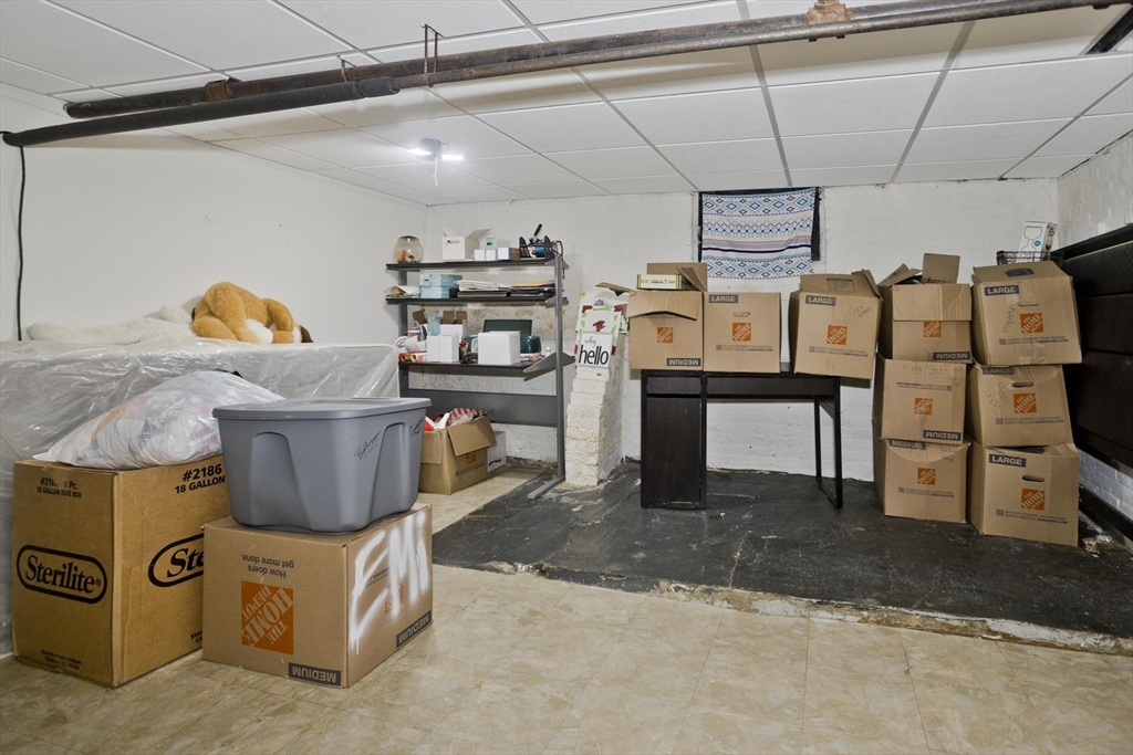 37 Phoenix Street Springfield, MA 01104 - Photo 24 of 39 a utility room with dryer and washer