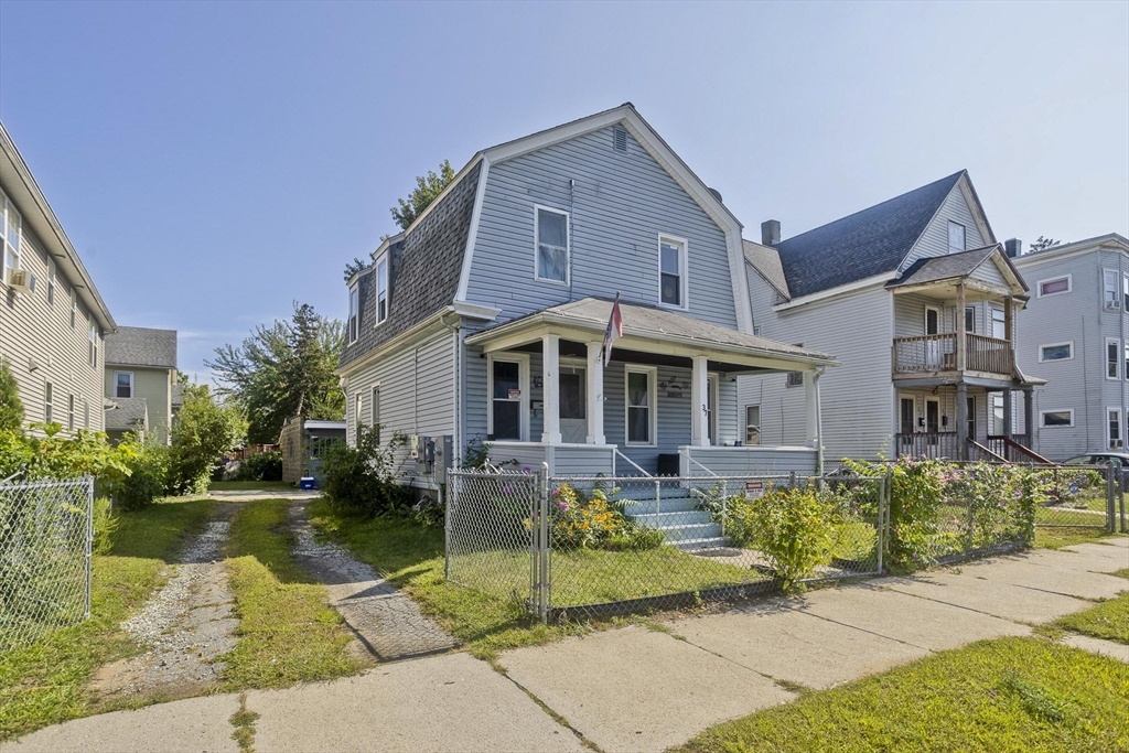 37 Phoenix Street Springfield, MA 01104 - Photo 30 of 39 a front view of a house with garden
