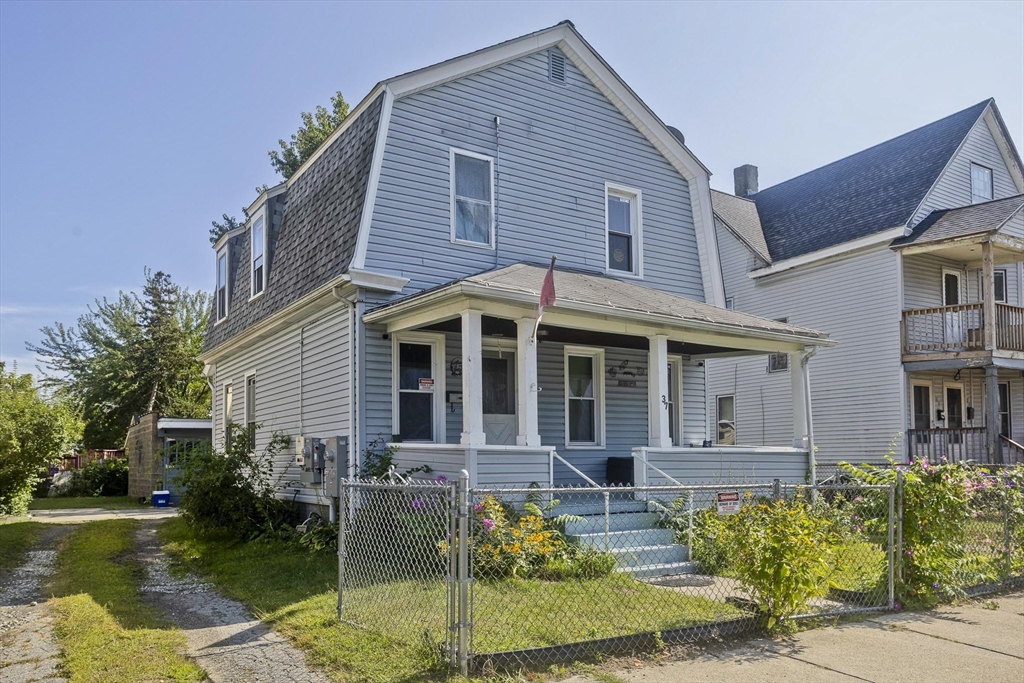 37 Phoenix Street Springfield, MA 01104 - Photo 31 of 39 a front view of a house with swimming pool having outdoor seating