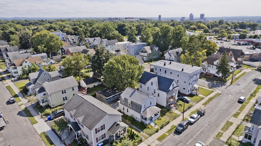 37 Phoenix Street Springfield, MA 01104 - Photo 37 of 39 an aerial view of a house with a yard