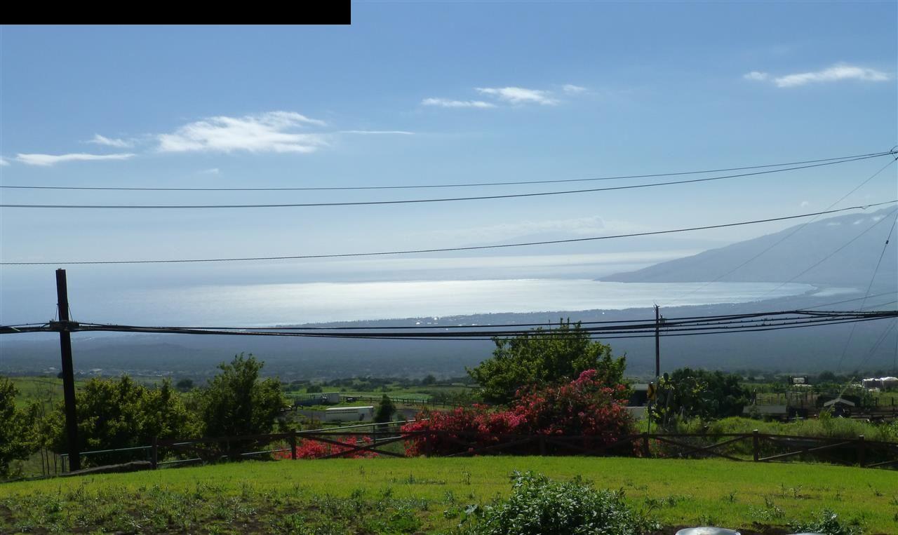 5821 Lower Kula Road Kula, HI 96790 - Photo 2 of 27 a view of a yard in front of a house