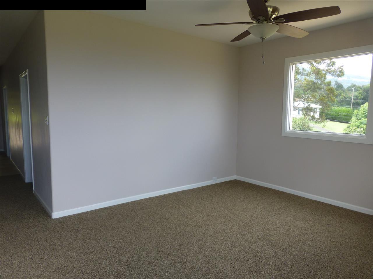 5821 Lower Kula Road Kula, HI 96790 - Photo 7 of 27 an empty room with a window