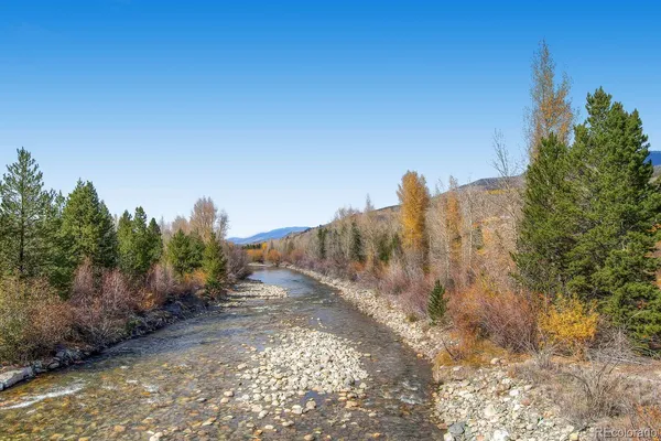 a view of a road with a building in the background
