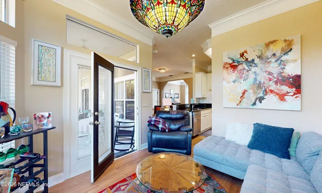 a house with a flower garden in front of it