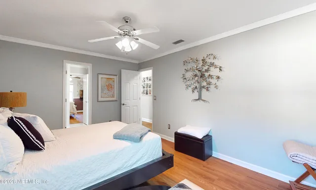 a swimming pool with outdoor seating and garden