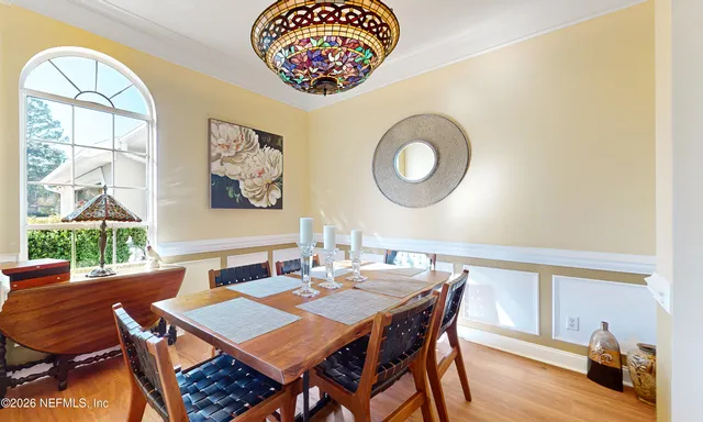 a kitchen with stainless steel appliances granite countertop a refrigerator stove microwave and sink