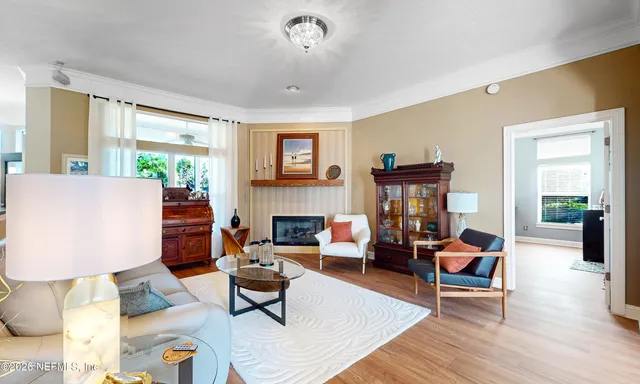 a bed room with furniture and a window