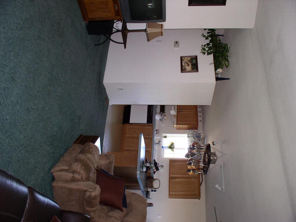 8190 Campbell Road Toppenish, WA 98948 - Photo 5 of 18 a living room with furniture and a flat screen tv