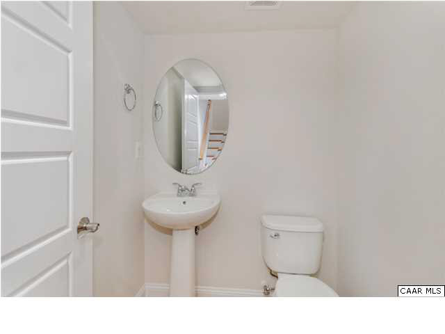 2315 Avinity Loop Charlottesville, VA 22902 - Photo 11 of 23 a bathroom with a sink toilet and a mirror