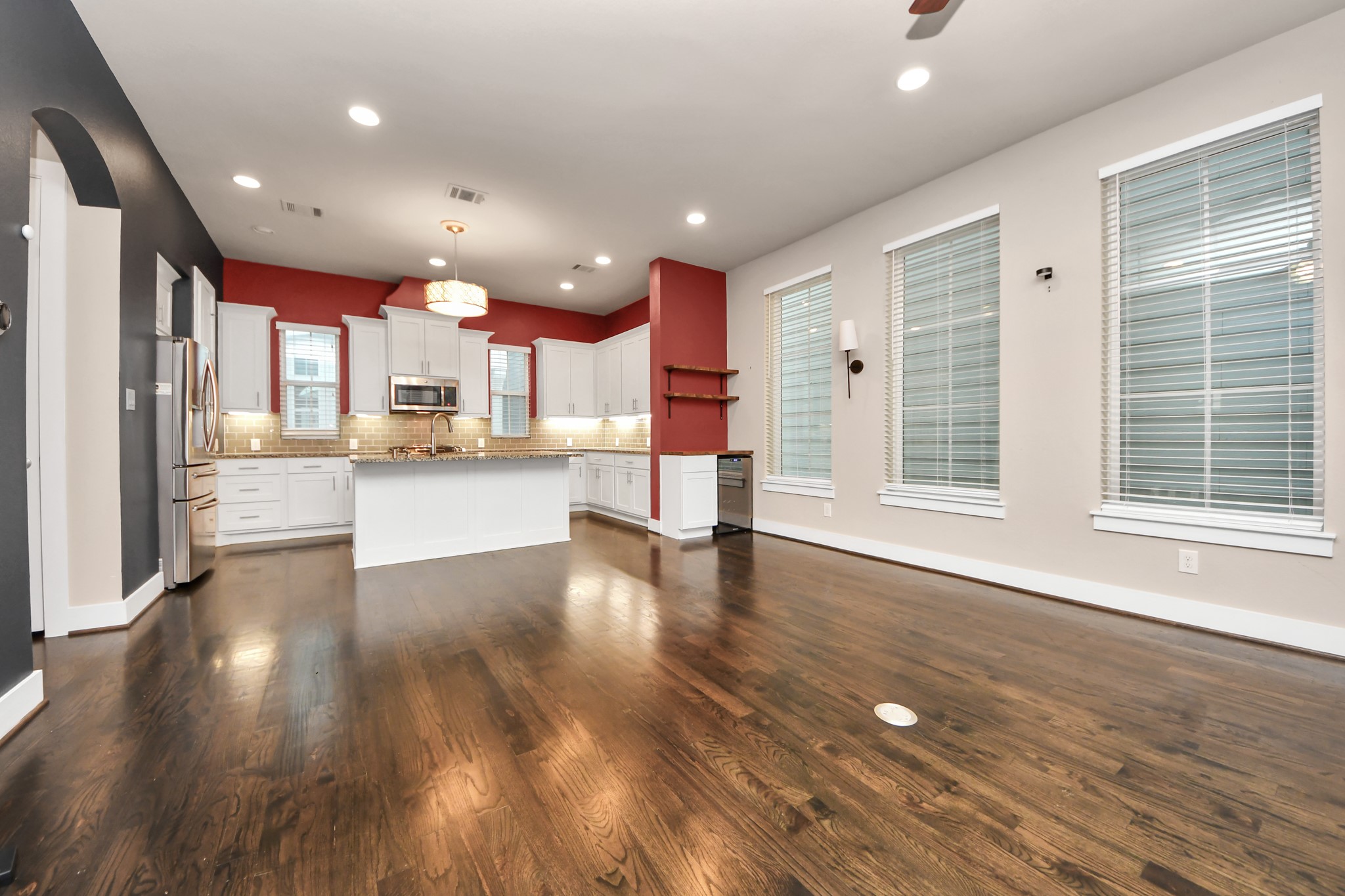2704 Freund Street Houston, TX 77003 - Photo 11 of 45 a view of kitchen with wooden floor and window