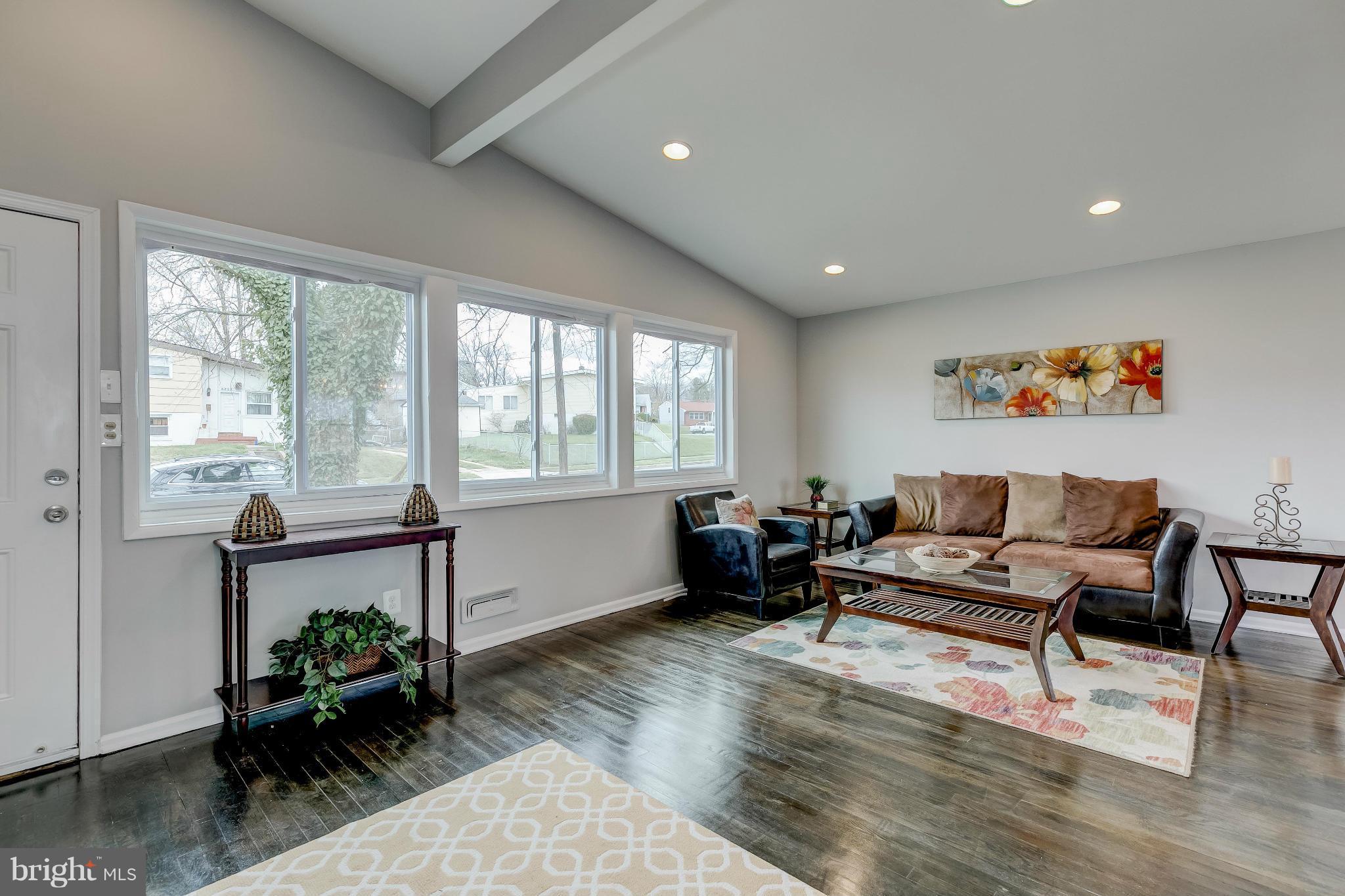 3504 Sedgemoor Road Baltimore, MD 21207 - Photo 3 of 22 Dark Hardwood Floors Throughout