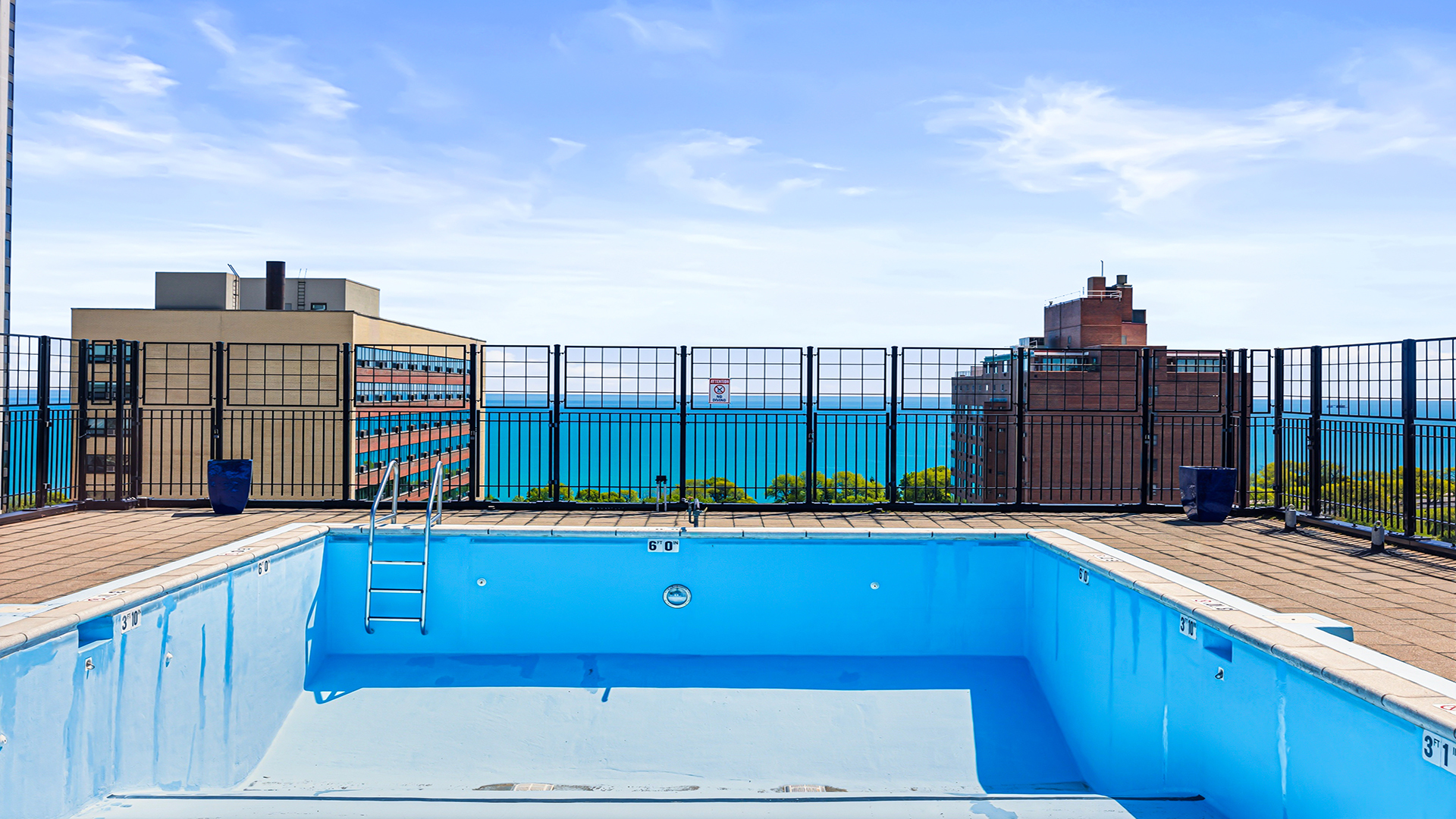 3110 North Sheridan Road, Unit 1807 Chicago, IL 60657 - Photo 17 of 21 a view of roof deck with a barbeque