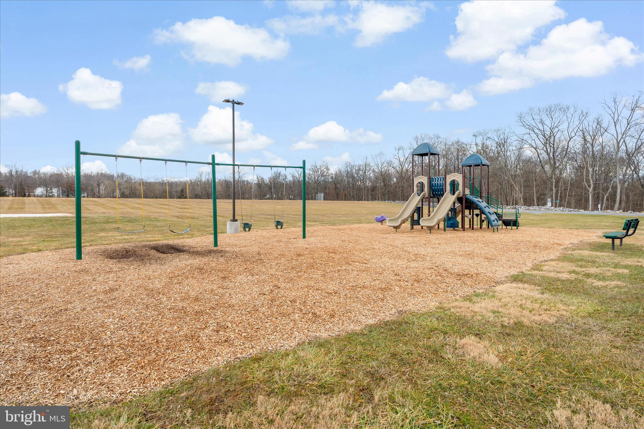 67 Lullwater Way Falling Waters, WV 25419 - Photo 46 of 56 a view of a park with swings