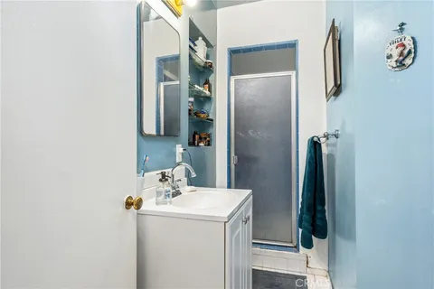a bathroom with a sink and mirror